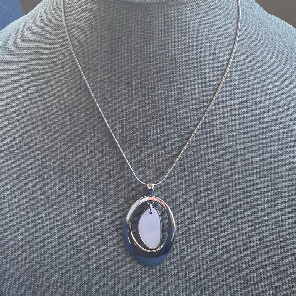Lia Sophia oblong silver tone modernist cut out pendant necklace